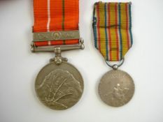 A French Medal of Honour for Firemen together with an Asian service medal, possibly Tibet:,