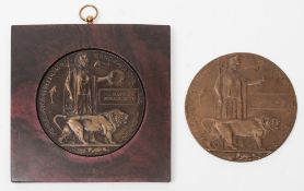 A World War One bronze memorial plaque to Ernest Ross: together with a reproduction memorial plaque