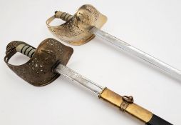Two Elizabeth II RAF dress swords by Wilkinson, London:, one numbered 88533,