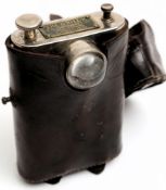 An 'Orilux' WWI trench light, by J H Steward Ltd , London:, in brown leather case.