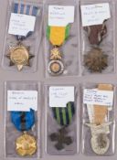 Six assorted world medals including: Syria Order of Bravery, Japanese Army air force pocket badge,