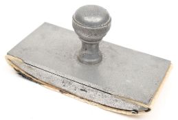 A WWI aluminium blotter 'Made from the Potter's Bar Zeppelin Oct 1st 1916':,
