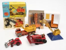 A boxed Corgi Priestman 'Cub' shovel (1128) together with two cranes, a bulldozer ,