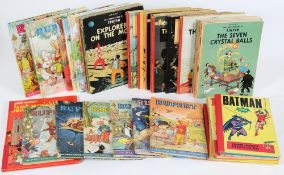 A quantity of Children's annuals including, Tin Tin, Rupert and others:.