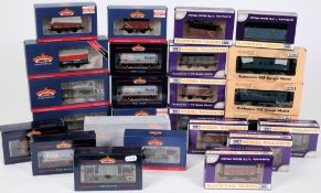 Dapol and Bachmann, a collection of assorted rolling stock: including petrol tankers, ore wagons,