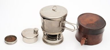 A folding travelling primus stove: contained in a leather case.
