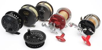 A Cartridge 375 trout reel: a Cartridge 355 trout reel,