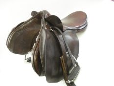 A brown leather cobb, or hack, saddle by Hayes of Cirencester:.