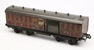 Basset Lowke, a gauge 1 T.P.O. bogie coach No 1924: in LMS maroon livery.