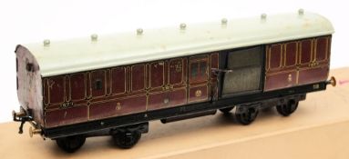 Basset Lowke, a gauge 1 T.P.O. bogie coach No 1924: in LMS maroon livery.