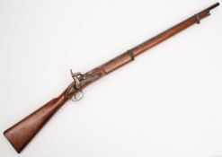 A percussion cap rifle:, unsigned, the 31 1/2 inch double ringed barrel with ramrod beneath,
