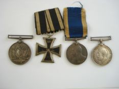 An unnamed Khedieve's Sudan Medal, together with an Iron Cross, and a War Medal and a RN LSGC pair:,