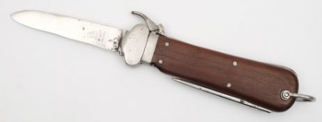 A WWII German Paratroopers gravity knife:, the blade etched 'SMF, Solingen, Rostfrie',