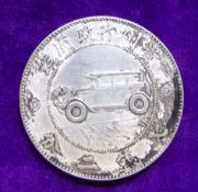 A silver Chinese automobile dollar Kweichow province, 1928:.