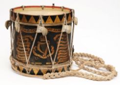 A Connaught Rangers side drum: painted with regimental badge and battle honours, 38cm. diameter.