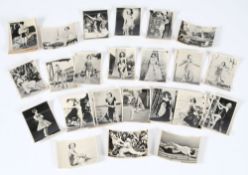 A collection of photographic cigarette cards,