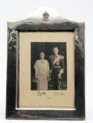 King George VI (1895-1952) and Elizabeth the Queen Mother (1900-2002) signed photograph in an