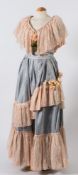 A handmade theatrical Victorian two piece ball gown:, in powder blue and silver patterned material,