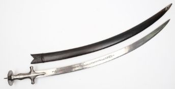 An Indian Tulwar:, of typical form with curved blade and polished steel handle,