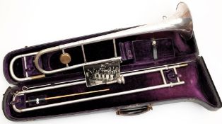 A nickel plated trombone by Conn, Elkhart, Ind, USA in fitted case:,