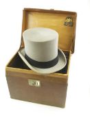 A grey top hat by Lincoln Bennett, size 7 1/4 in a brown leather hat box:.
