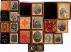 A collection of eleven various ambrotypes: mostly quarter plate and a leather photograph case.