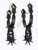 A pair of 18th century steel spurs: 20cm. long.