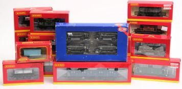 Hornby and Heljan, a collection of assorted rolling stock: including petrol tankers, ore wagons,