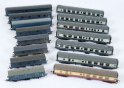 A collection of assorted various passenger coaches: and parcel coaches, mostly BR blue livery,