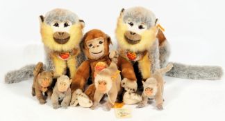 Steiff, a collection of seven modern monkeys: of various sizes, with moulded faces and plush bodies.