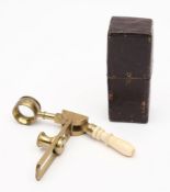 A 19th century ivory handled folding spyglass in case:,