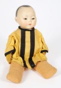 An Armand Marseille bisque head Chinese doll: impressed AM. Germany.
