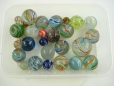 A small collection of marbles including cane twist and birdcage examples:..