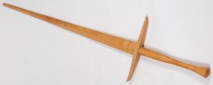 A wooden shop display sword: 139cm. long.
