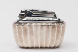 A Ronson plated presentation table lighter: with regimental inscription.