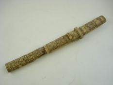An early 20th century Japanese Tanto in carved bone scabbard:,