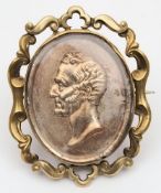 Duke of Wellington Memorial 1852 - a small silvered glazed brooch: with a scrolled gilt metal