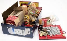 A collection of various mid 20th century toys and games 'Etch a Sketch' and a clockwork juggling