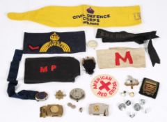 A small collection of assorted armbands: including Military Police, Civil Defence Corps, H.M.S.
