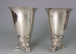 A pair of Italian plated stirrup cups,: the bases in the form of foxes masks, 13.5cm. high.