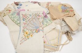 An extensive collection of embroidered table linen: including tablecloths, napkins,