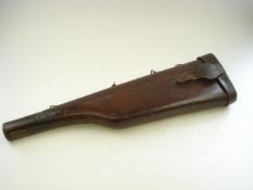 A brown leather 'leg o' mutton' gun case:, initialed 'SVR' to top, 80 cm long.