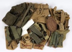A large collection of WW1, WWII and later British and American webbing: including bags, belts,