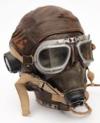 A WWII period brown leather flying helmet, goggles and face mask:,