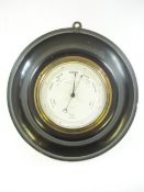 A late 19th century ebonised circular aneroid barometer for Bute Docks by William Weichert,