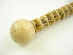 A fish vertebrae and marine ivory walking cane:,