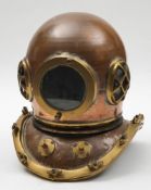 A decorative copper and brass 12 bolt diver's helmet, unsigned:, in manner of Siebe,