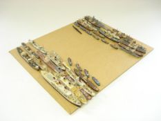 A collection of diecast and scratch built waterline models:, including tugs,