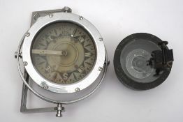 A 4 inch liquid filled compass by Simpson Lawrence & Co, Glasgow on a nickel plated gimbal mount,