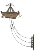 A 19th century wine merchant's shop sign in the form of a galleon:,